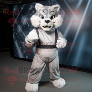 Silver Bobcat mascot costume character dressed with a Tank Top and Wraps