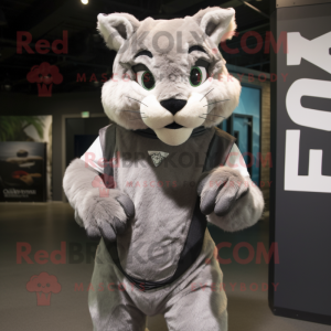 Silver Bobcat mascot costume character dressed with a Tank Top and Wraps