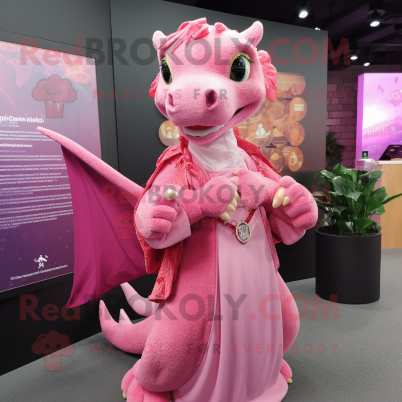 Pink Dragon mascot costume character dressed with a Blouse and Shawls Pink Dragon mascot costume character dressed with a Blouse and Shawls