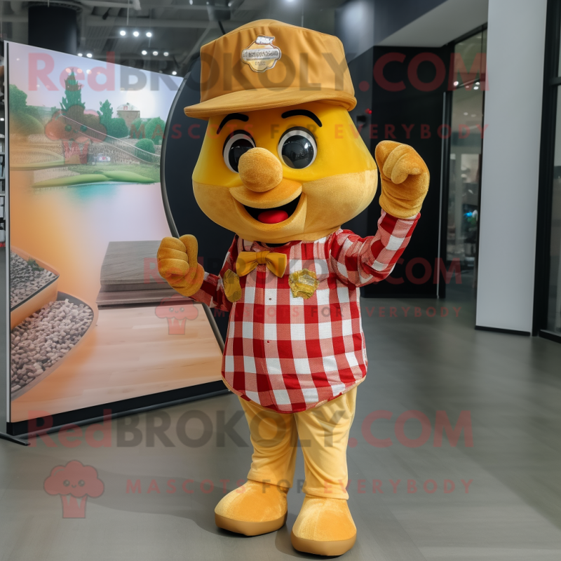 Gold Cherry mascot costume character dressed with a Flannel Shirt and Hat pins