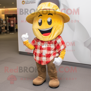 Gold Cherry mascot costume character dressed with a Flannel Shirt and Hat pins