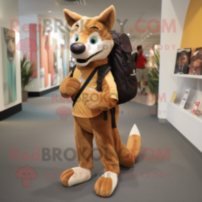 Brown Dingo mascot costume character dressed with a Capri Pants and Backpacks