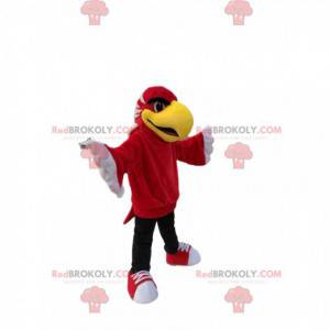 Mascot red eagle with a big yellow beak. Eagle costume -