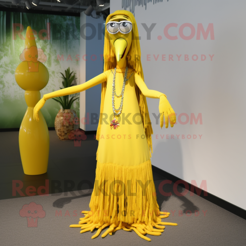 Yellow Stilt Walker mascot costume character dressed with a Maxi Skirt and Necklaces Yellow Stilt Walker mascot costume character dressed with a Maxi Skirt and Necklaces