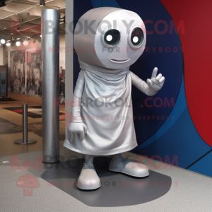 Silver Cyclops mascot costume character dressed with a Wrap Dress and Shoe laces