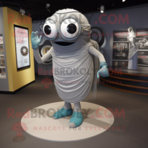 Silver Cyclops mascot costume character dressed with a Wrap Dress and Shoe laces