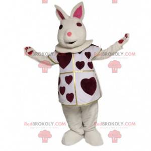 Mascotte de lapin blanc avec des cœurs bordeaux. Costume de