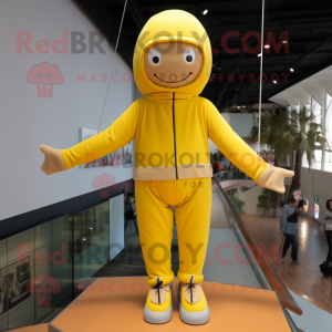 Yellow Tightrope Walker mascot costume character dressed with a Hoodie and Caps