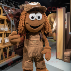 Brown Spaghetti mascot costume character dressed with a Dungarees and Backpacks