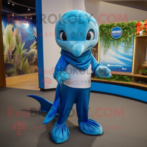 Blue Dolphin mascot costume character dressed with a Capri Pants and Scarves