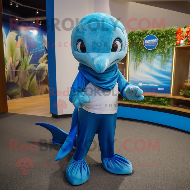Blue Dolphin mascot costume character dressed with a Capri Pants and Scarves