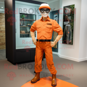 Orange Gi Joe mascot costume character dressed with a Oxford Shirt and Eyeglasses