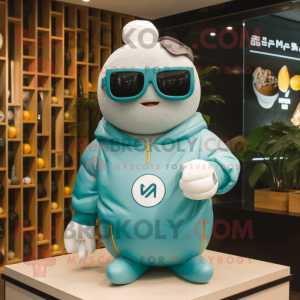 Cyan Dim Sum mascot costume character dressed with a Sweatshirt and Sunglasses