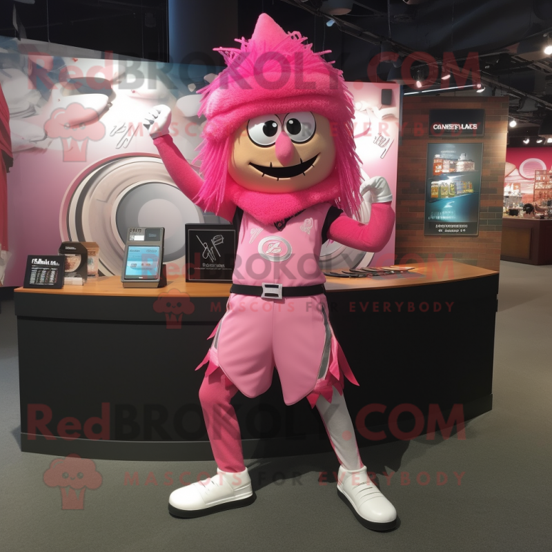 Pink Knife Thrower mascot costume character dressed with a Running Shorts and Bracelet watches