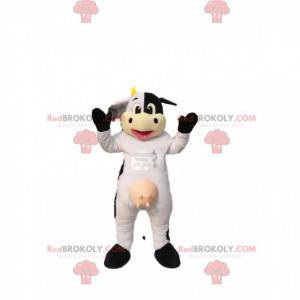 Mascot vaca blanca y negra, con cuernos amarillos. -