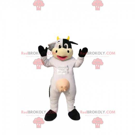 Vaca mascote branca e preta, com chifres amarelos. -