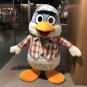 Peach Penguin mascot costume character dressed with a Flannel Shirt and Cufflinks
