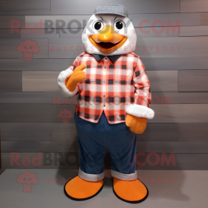 Peach Penguin mascot costume character dressed with a Flannel Shirt and Cufflinks