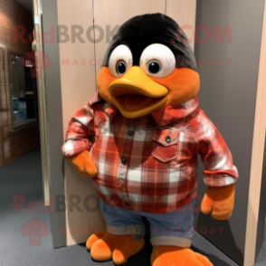 Peach Penguin mascot costume character dressed with a Flannel Shirt and Cufflinks
