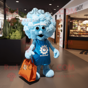Sky Blue Cauliflower mascot costume character dressed with a Graphic Tee and Tote bags