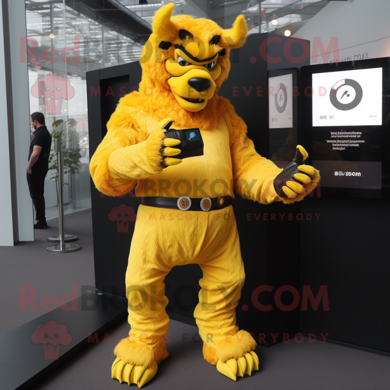 Yellow Minotaur mascot costume character dressed with a Jumpsuit and Digital watches Yellow Minotaur mascot costume character dressed with a Jumpsuit and Digital watches