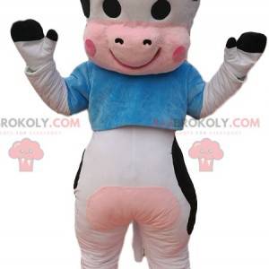 Mascote vaca preto e branco com uma camisa azul - Redbrokoly.com