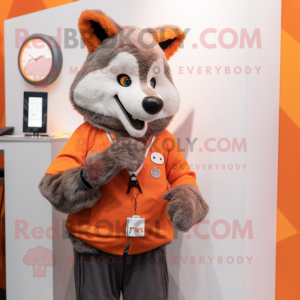 Orange Say Wolf mascot costume character dressed with a Cardigan and Smartwatches