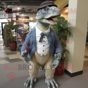 Gray Iguanodon mascot costume character dressed with a Dress Shirt and Hat pins