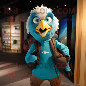 Turquoise Haast'S Eagle mascot costume character dressed with a Rugby Shirt and Backpacks