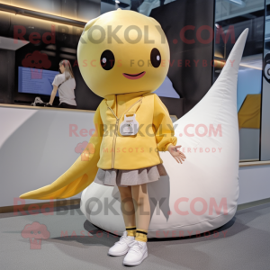 Gold Narwhal mascot costume character dressed with a Mini Skirt and Shoe laces