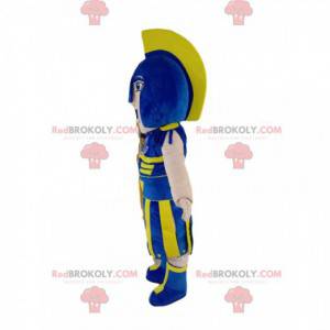 Romeinse soldaatmascotte met een blauwe en gele helm -