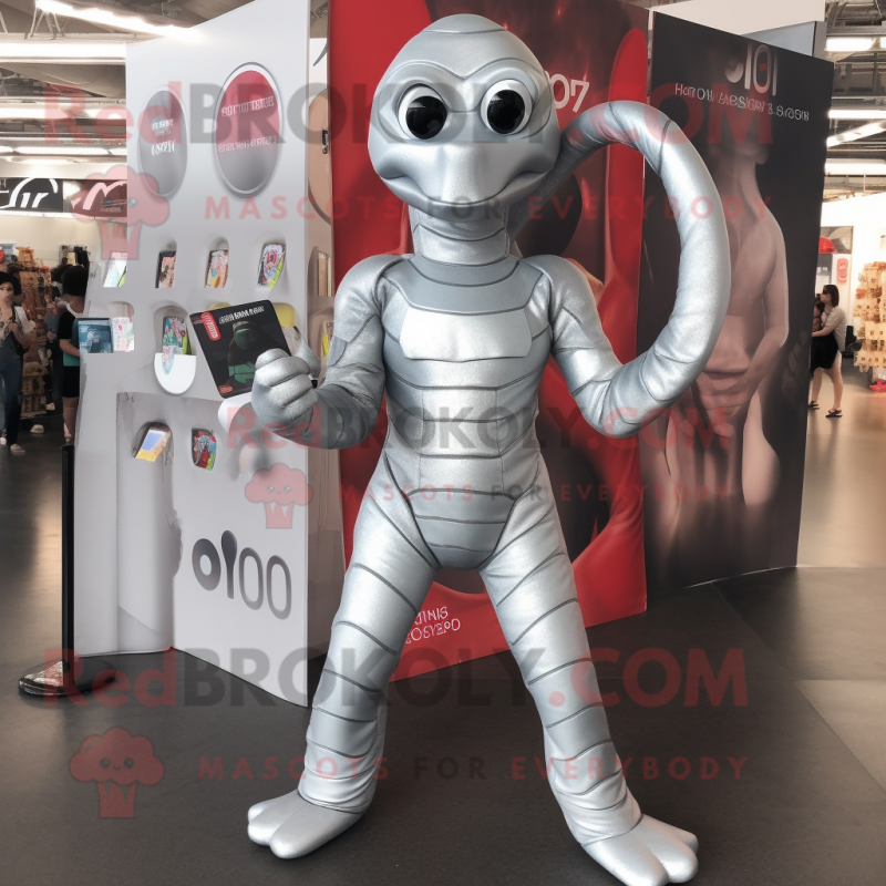 Silver Hydra mascot costume character dressed with a Playsuit and Wallets Silver Hydra mascot costume character dressed with a Playsuit and Wallets