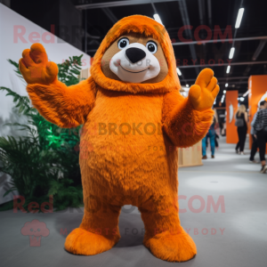 Orange Giant Sloth mascot costume character dressed with a Trousers and Beanies