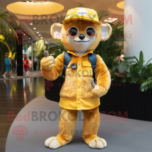 Gold Lemur mascot costume character dressed with a Flare Jeans and Caps