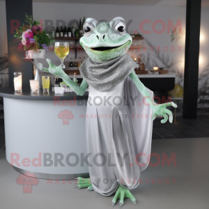 Silver Frog mascot costume character dressed with a Cocktail Dress and Shawls