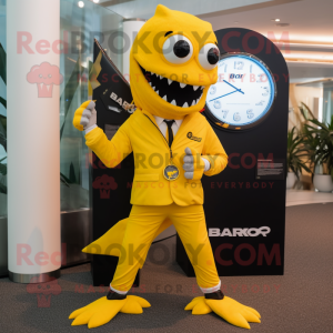Yellow Barracuda mascot costume character dressed with a Suit and Smartwatches