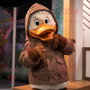 Brown Goose mascot costume character dressed with a Hoodie and Beanies