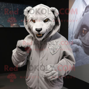 Silver Smilodon mascot costume character dressed with a Hoodie and Brooches