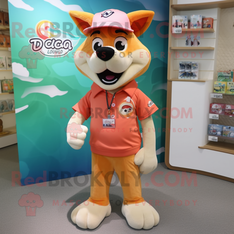 Peach Dingo mascot costume character dressed with a Shorts and Lapel pins