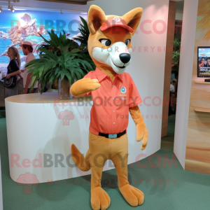 Peach Dingo mascot costume character dressed with a Shorts and Lapel pins