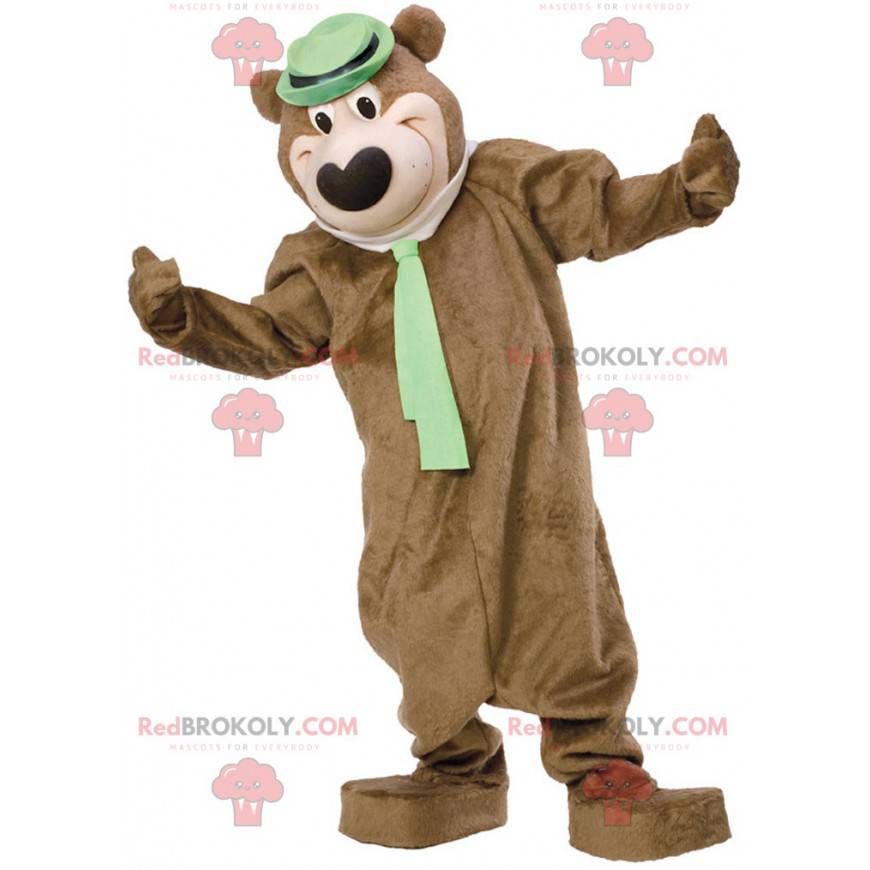Bruine beer mascotte met een hoed en een stropdas -