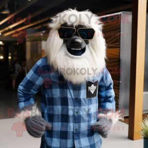 Navy Yeti mascot costume character dressed with a Flannel Shirt and Sunglasses