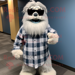 Navy Yeti mascot costume character dressed with a Flannel Shirt and Sunglasses