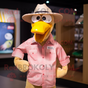 Gold Flamingo mascot costume character dressed with a Oxford Shirt and Hat pins
