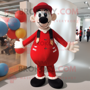 Red Juggle mascot costume character dressed with a Coat and Suspenders