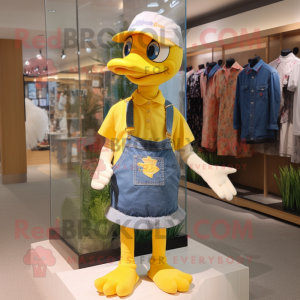 Yellow Swans mascot costume character dressed with a Denim Shorts and Headbands
