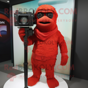 Red Camera mascot costume character dressed with a Cover-up and Anklets