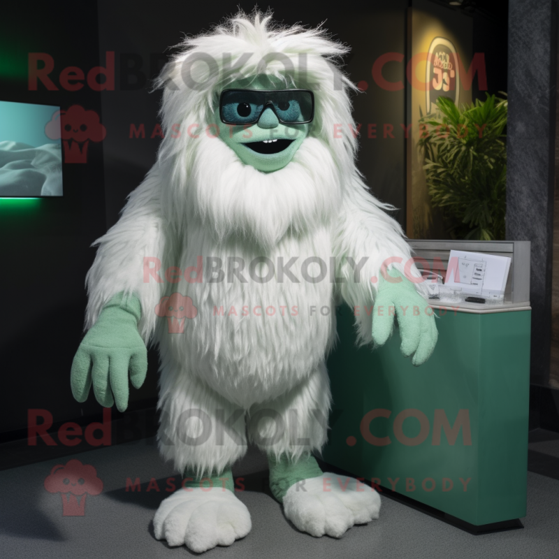 Green Yeti mascot costume character dressed with a Pencil Skirt and Eyeglasses Green Yeti mascot costume character dressed with a Pencil Skirt and Eyeglasses