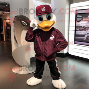 Maroon Swan mascot costume character dressed with a Moto Jacket and Hat pins