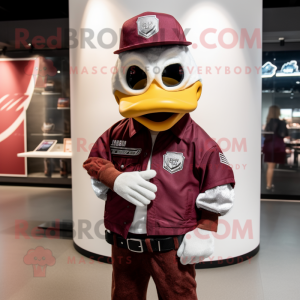 Maroon Swan mascot costume character dressed with a Moto Jacket and Hat pins